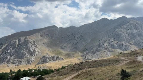 Rocky Mountain Peaks and Dramatic Clouds in Feslikan Plateau Antalya Turkey Stock Footage 343831174
