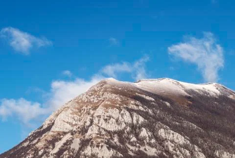 Rocky mountain plain top with clouds Stock Photos
