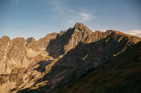 Rocky Mountain Range Under Clear Sky Stock Photos