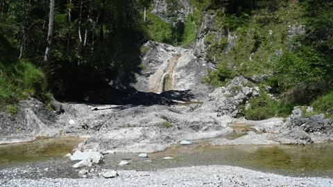 A rocky mountain river with waterfall in the forest Video stock 212758682