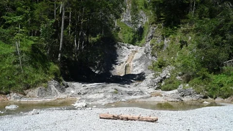 A rocky mountain river with waterfall in the forest Video stock 212759730