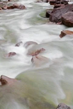 Rocky mountain stream vertical Stock Photos