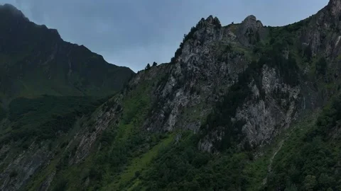 Rocky Mountain under Cloudy Rainy Sky Stock Footage 318467922