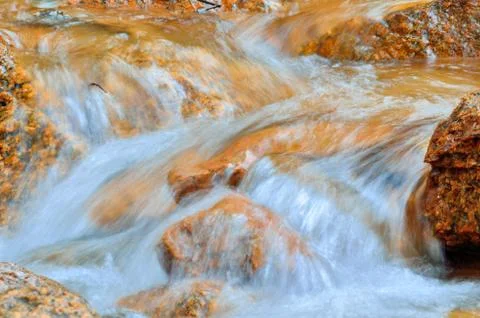 Rocky mountains stream Stock Photos