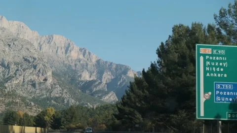 Rocky mountains of the Taurus range in Turkey with a road sign to Ankara Stock Footage 146029600