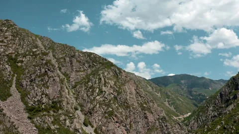 Rocky mountains with vegetation 스톡 동영상 243574548