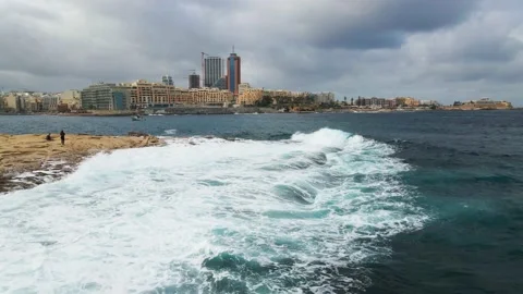 Rocky ocean coast Big waves with white foam on the shore Drone footage the move. Stock Footage 233595574