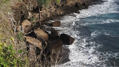 Rocky ocean shore with small waves close up Stock Footage 81217355