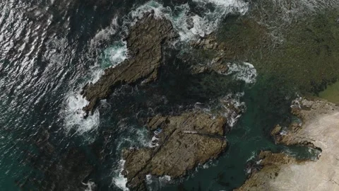 Rocky Ocean Shoreline Reverse Stock Footage 264336085