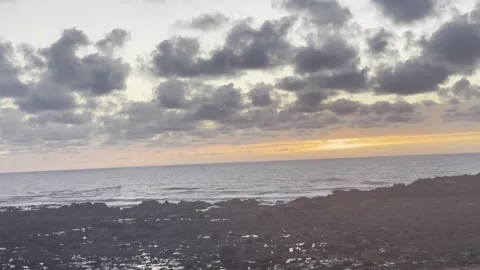 Rocky Ocean Sunset Under Dramatic Clouds For Cinematic Nature Video Length Stock Footage 334871901