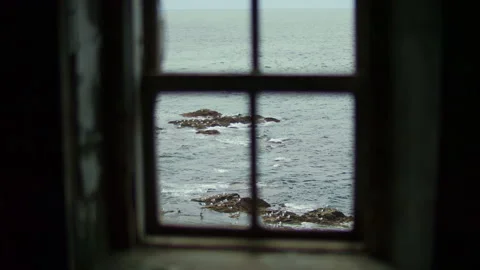 Rocky Ocean View Through Window Stock Footage 297039284