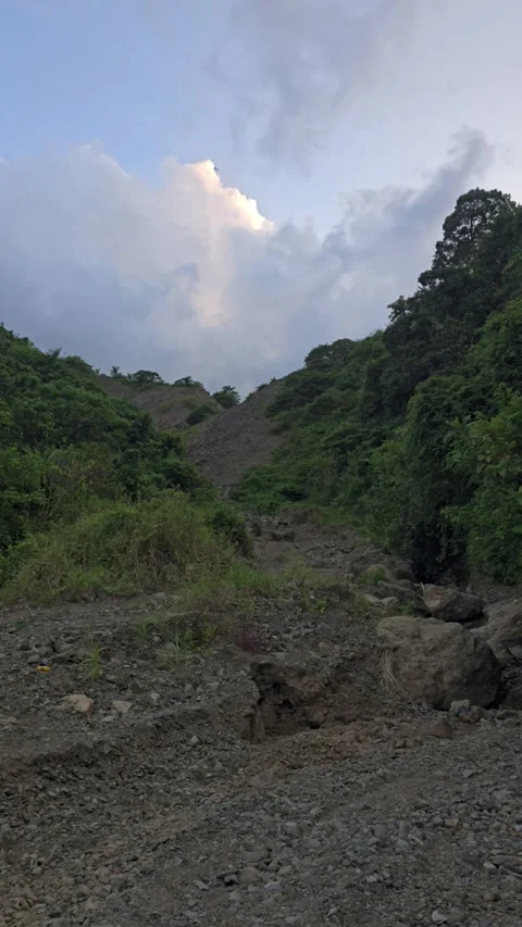 Rocky Path Through A Tropical Mountain Landscape Surrounded By Green Forest Stock Footage 339829656