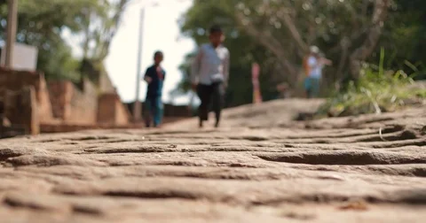 A rocky path on the way to a Buddhist temple in Sri Lanka Stock Footage 85325639