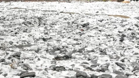 Rocky pathway with snowfall or first snow fallinng on the ground surface in.. 스톡 동영상 275670611