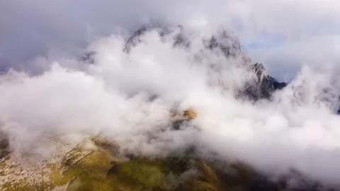 Rocky peak in the clouds Stock Footage 237866563