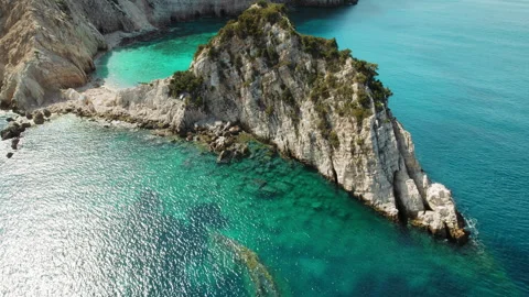 Rocky peninsula surrounded by emerald blue sea in Kefalonia Ionian island Greece Stock Footage 327611887