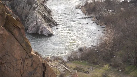 Rocky rapids with a view of the river Stock Footage 126051628