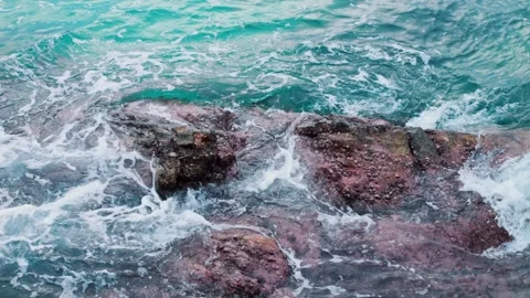 Rocky reefs and breaking waves of cliffs of sea coast. Breathtaking time-lapse Stock Footage 242366252