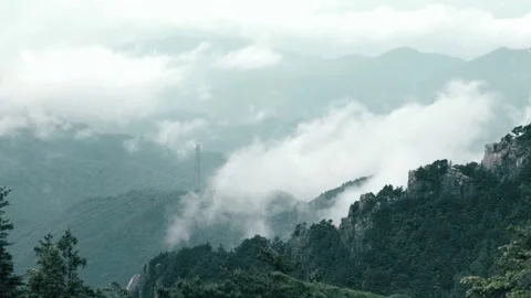 Rocky Ridges and Low Clouds from Summit Trail to Mount Kinpu, Japan Stock Footage 337977635
