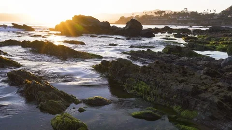 The Rocky Riffs at Low Tide During Sunset Stock Footage 113710088