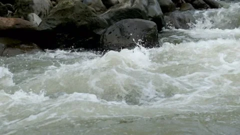 Rocky river flow with clear water in the mountains Видео 297653584