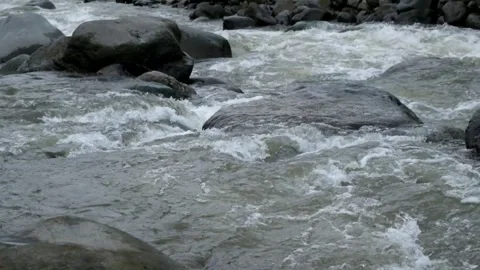 Rocky river flow with clear water in the mountains Video stock 297653628