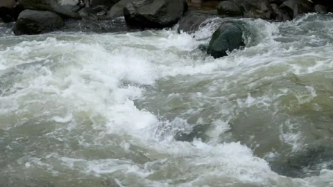 Rocky river flow with clear water in the mountains Video stock 297653642
