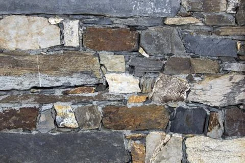 Rocky rough wall Stock Photos