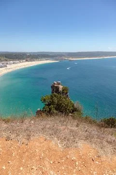 Rocky Sea Stack Above the Atlantic in Nazare, Portugaln Stock Photos