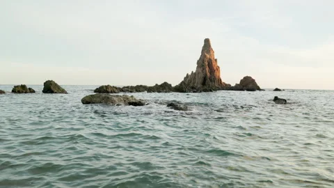 Rocky Sea Stack at Sunset in Cabo de Gata, Almeria, Spain Stock Footage 309053197