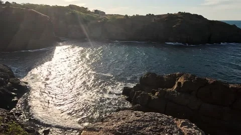 Rocky Seascape Sun Light Sky Clouds Background Stock Footage 339970080