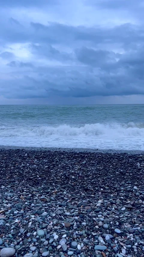 Rocky seashore. Clouds over the sea. Video stock 336915320
