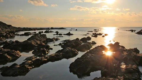 Rocky Shore and the Reflection of the Sunset Stock-Footage 327540871