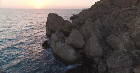 Rocky Shore during Sunset in Malta Stock Footage 67184247