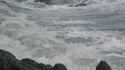 Rocky shore in the ocean Stock Footage 75890025