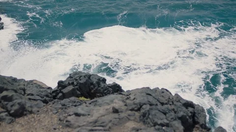 Rocky shore in the ocean Stock Footage 75927976