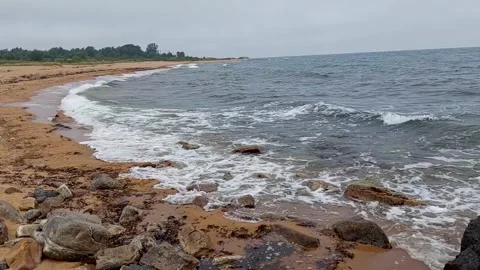 Rocky Shore By The Ocean With Waves Rolling In Stock Footage 252014922
