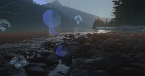 Rocky shoreline holding steady as frames advancing and sun lowering, tech charts Stock Footage 334312216