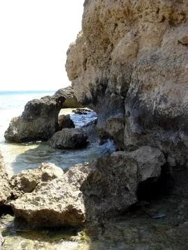 Rocky Shores of the Red Sea Showcase Clear Waters and Unique Rock Formation.. Stock Photos