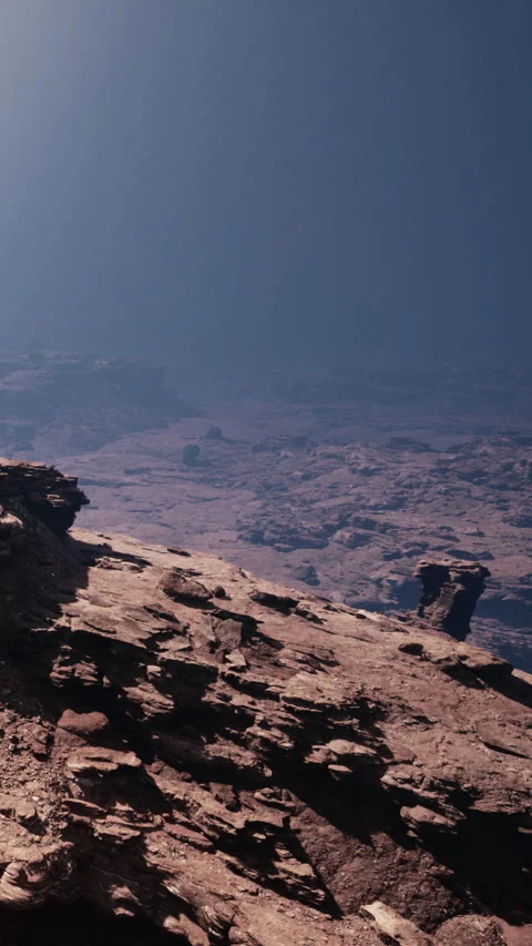 Rocky terrain with sun rays and shadow during the day in an open area Stock Footage 340646418