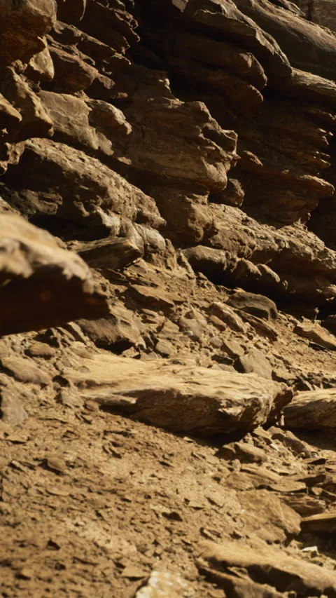 Rocky terrain surrounded by natures earthy palette at sunset Video stock 334257533