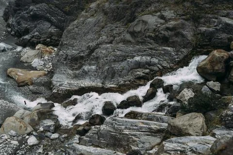 Rocky Waterfall in flowing down into small rocky river, in Hualien Taiwan. Stock Photos