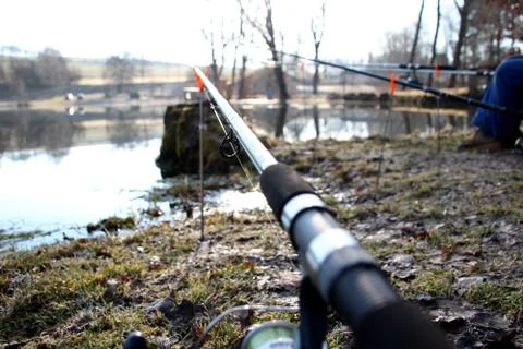 Rod eyelet, spring feeder fishing on Czech lake, waiting for wild animal in.. Stock Photos