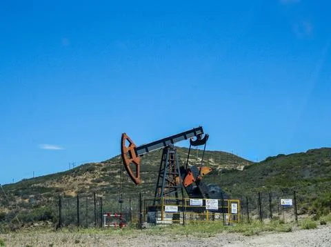 The rod pump at work in the extraction of crude oil.Puerto Madryn, Argentina Stock Photos