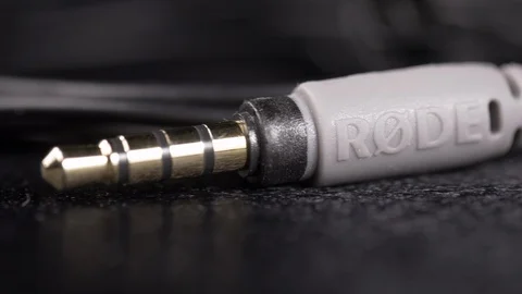 Rode TRRS Adapter medium closeup 4k Stock Footage 107867076