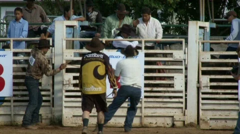 Rodeo Cowboys - Bull Riding in Slow Motion - Clip 10 of 12 Stock Footage