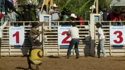 Rodeo Cowboys - Bull Riding in Slow Motion - Clip 5 of 12 Stock Footage