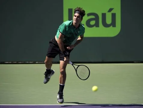  Roger Federer in action on day 8 of the Miami Open at Crandon Park Tennis... Fotos Stock