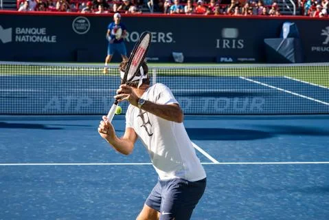Roger Federer, practicing during the Roger Cup Stock Photos
