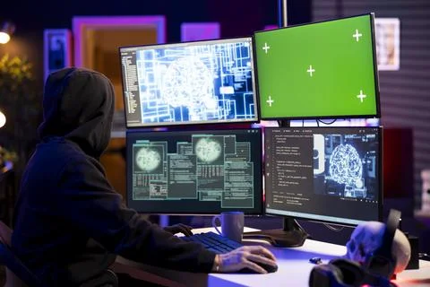 Rogue programmer uses AI on isolated screen PC to develop malware 스톡 사진